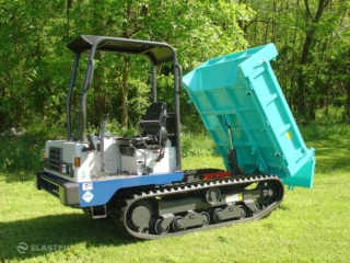 Specialized oil spill response vehicle with tilting bed