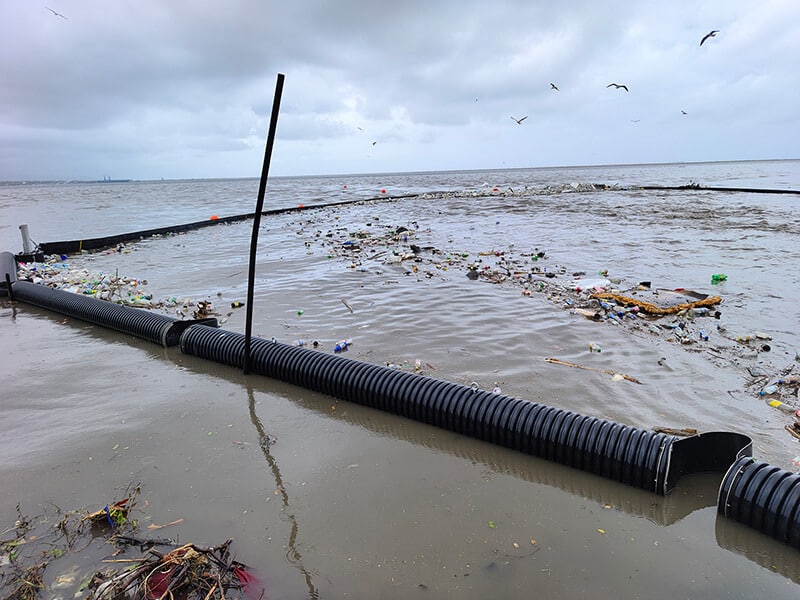 Plastic pollution barrier