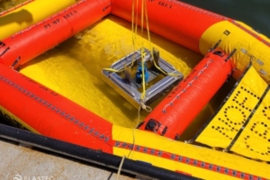 Elastec floating oil pump in water