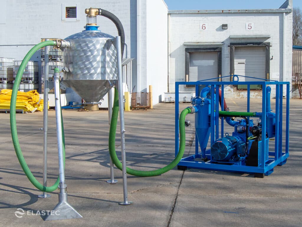 Electric industrial vacuum system with hopper