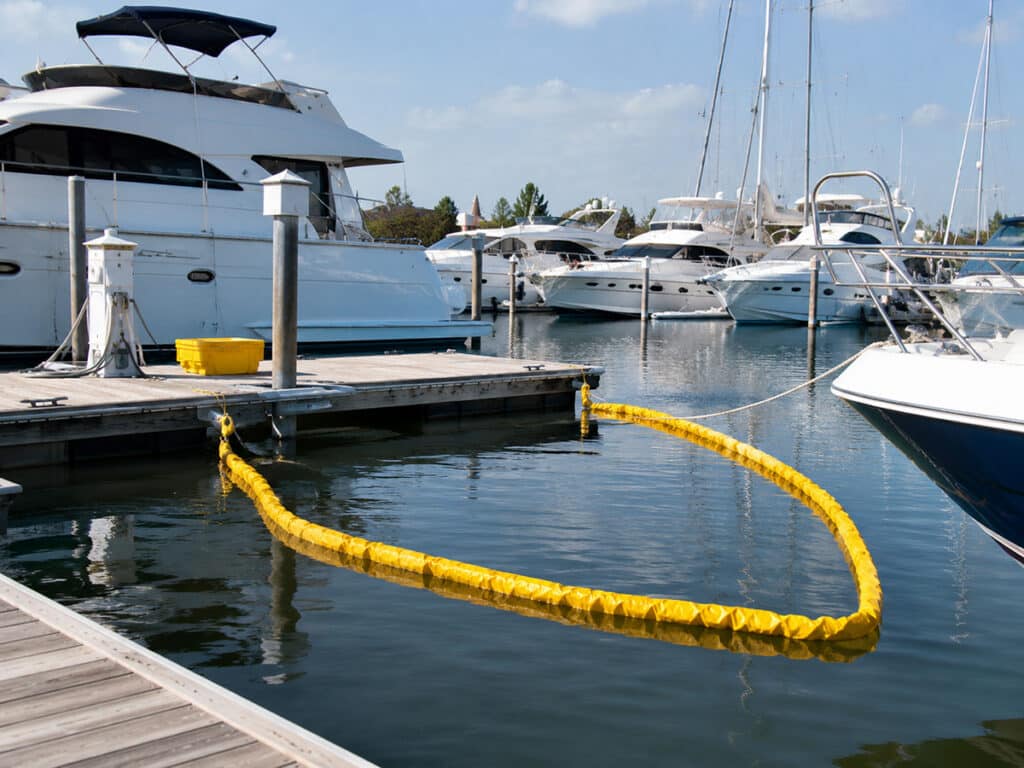 Marina and yacht portable containment boom. For illustrative purposes only.